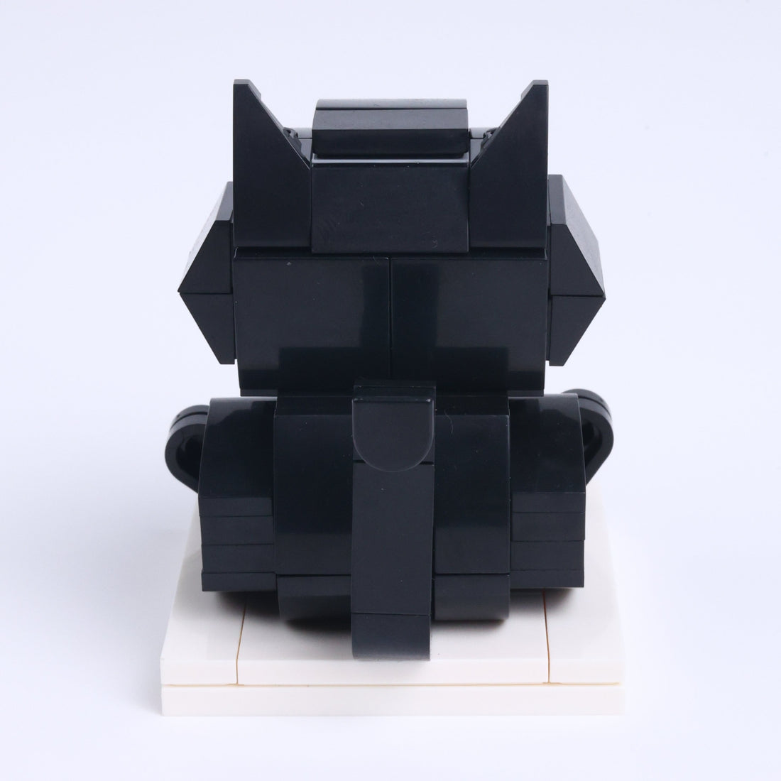Black Cat cat brick figure, back view