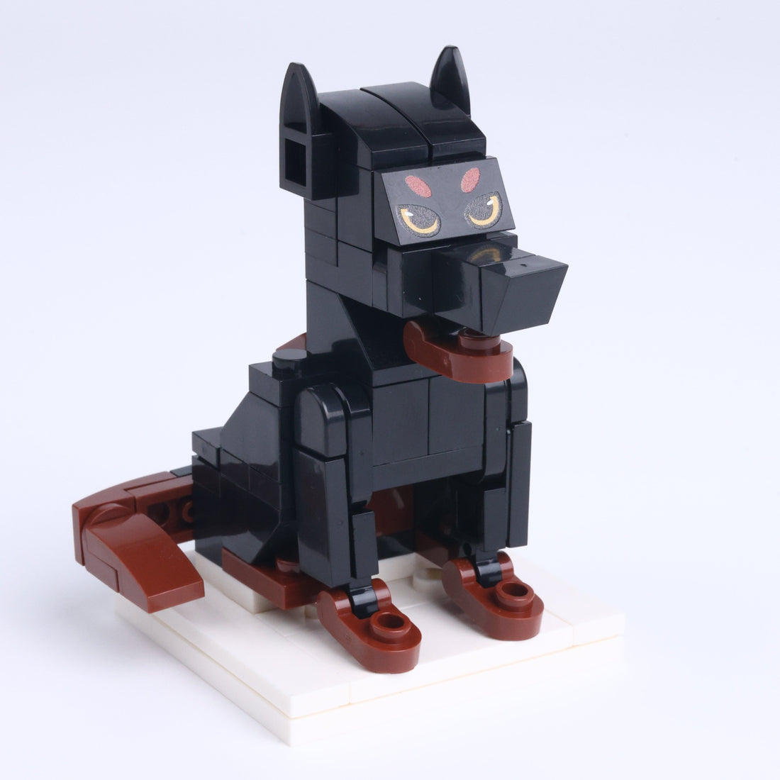 Black Doberman dog brick figure, left-side view