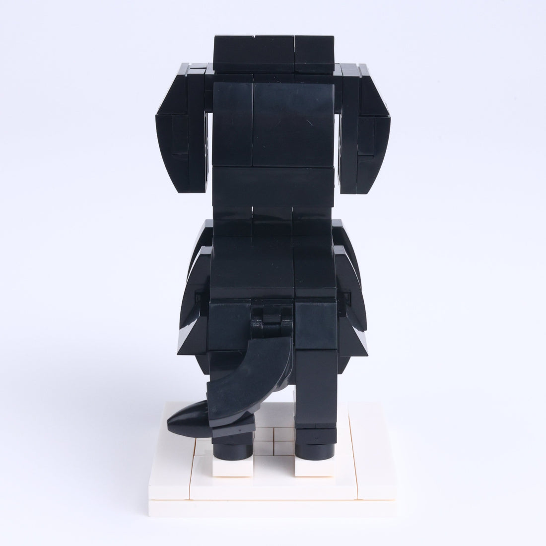 Black Labrador dog brick figure, back view