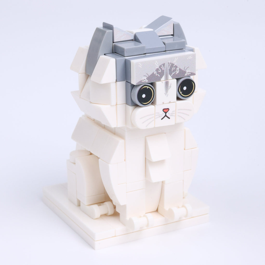 Gray White Longhair cat brick figure, left-side view