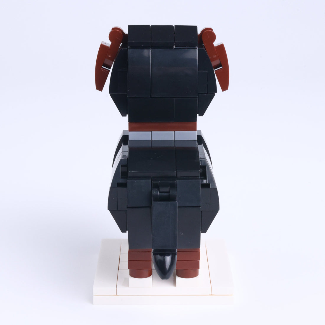 Rottweiler dog brick figure, back view