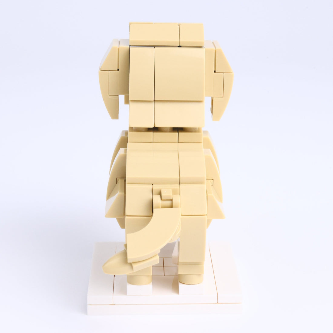 Yellow Labrador dog brick figure, back view
