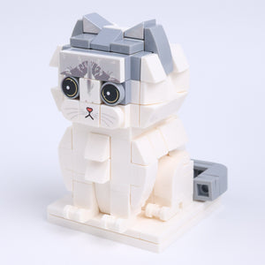 Gray White Longhair cat brick figure, right-side view