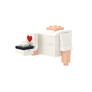 Ring brick figure accessory, right-side view